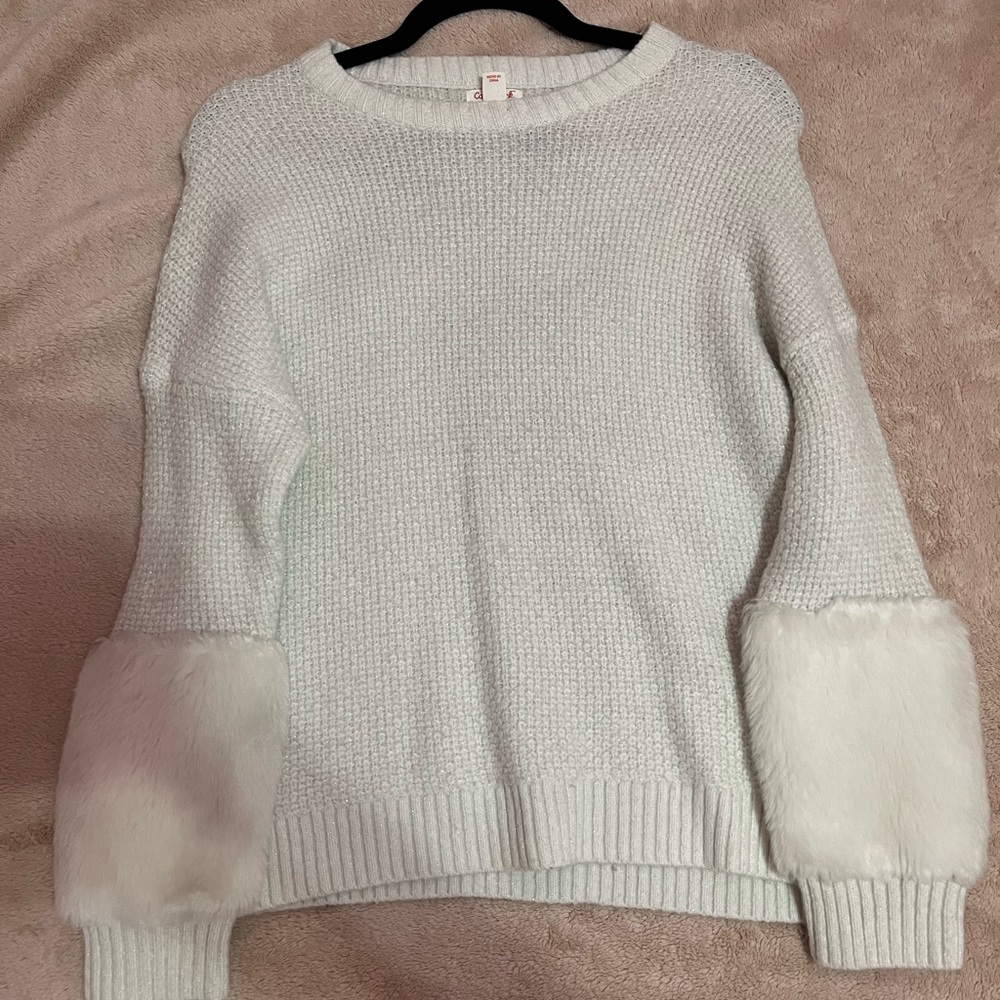 White fluffy sweater with fuzzy sleeves